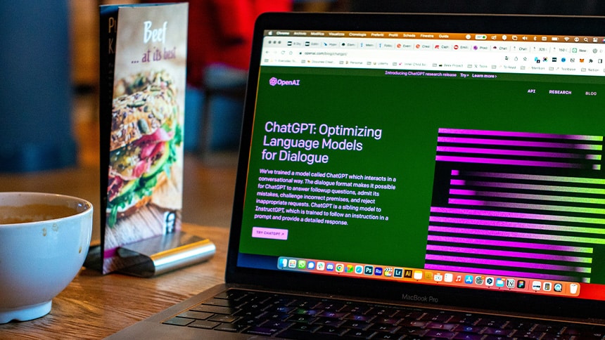 Chat GPT displayed on a laptop in a Restaurant